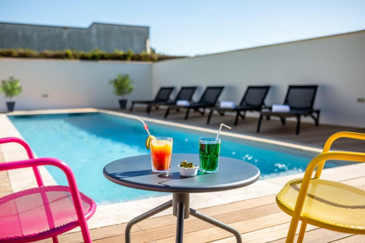 Hotel ibis Carcassonne Est la Cité Esterno foto