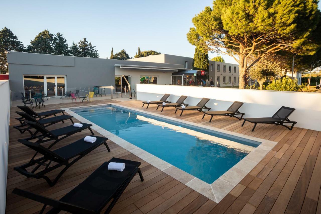 Hotel ibis Carcassonne Est la Cité Esterno foto