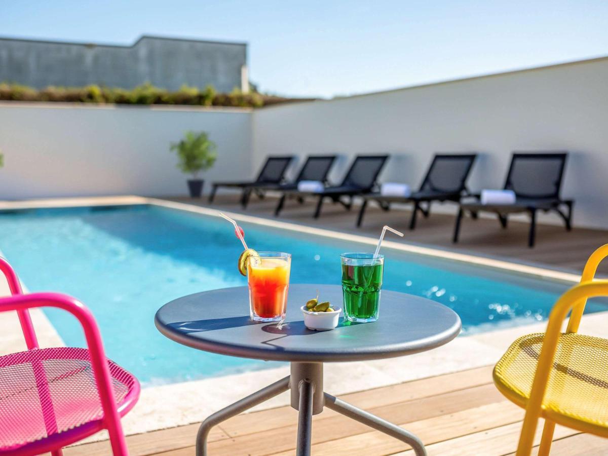 Hotel ibis Carcassonne Est la Cité Esterno foto